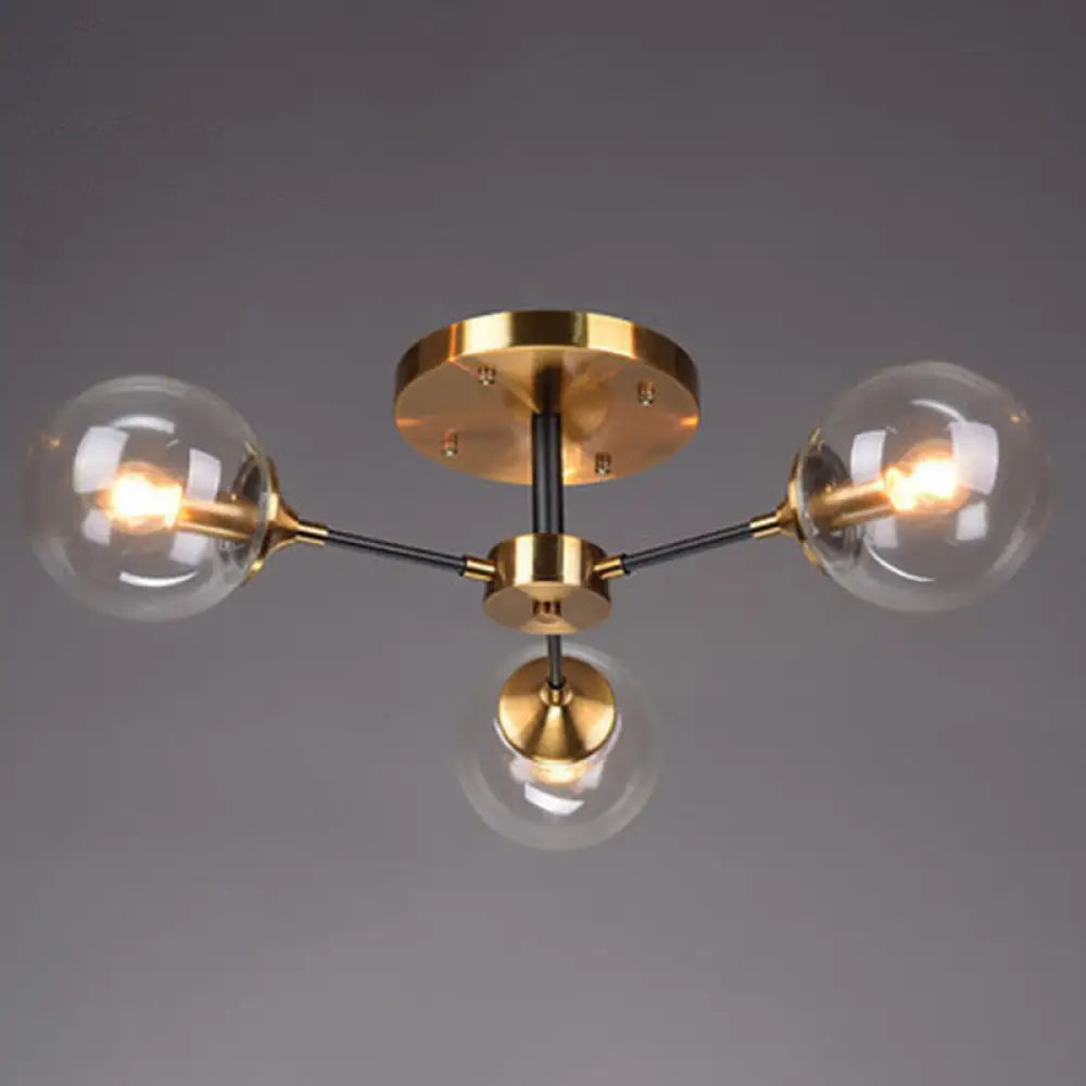Postmodern Brass Finish Radial Ceiling Lamp With Glass Ball Shade 3 / Clear