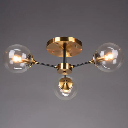 Postmodern Brass Finish Radial Ceiling Lamp With Glass Ball Shade 3 / Clear