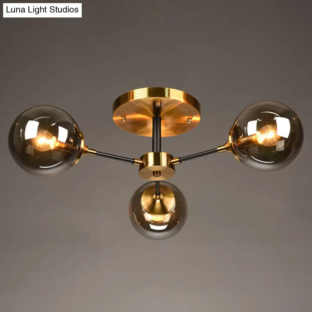 Postmodern Brass Flush Mount Light With Burst Design And Glass Ball For Living Room 3 / Smoke Gray