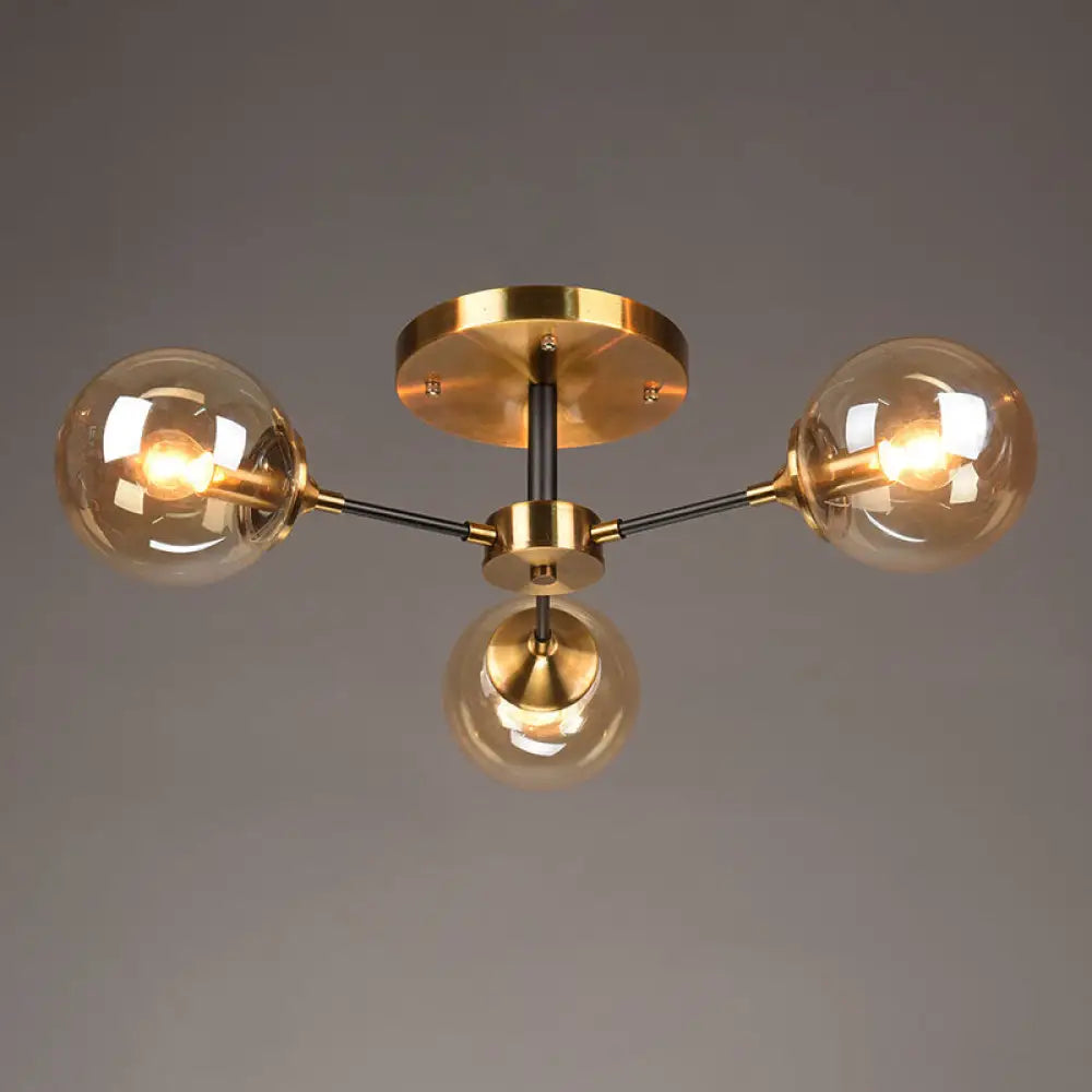 Postmodern Brass Flush Mount Light With Burst Design And Glass Ball For Living Room 3 / Amber