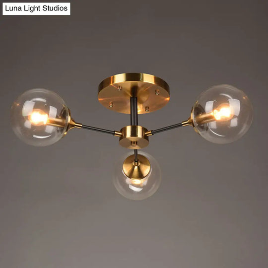 Postmodern Brass Flush Mount Light With Burst Design And Glass Ball For Living Room 3 / Clear
