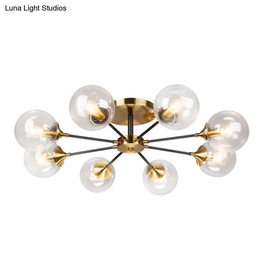 Postmodern Brass Flush Mount Light With Burst Design And Glass Ball For Living Room