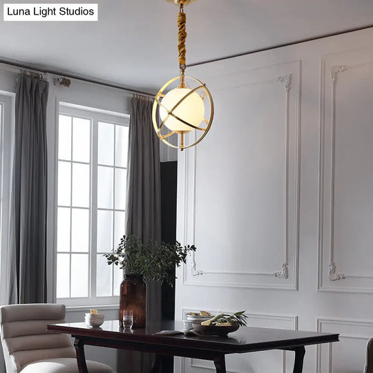 Postmodern Brass Orbit Pendant Light With Glass Shade