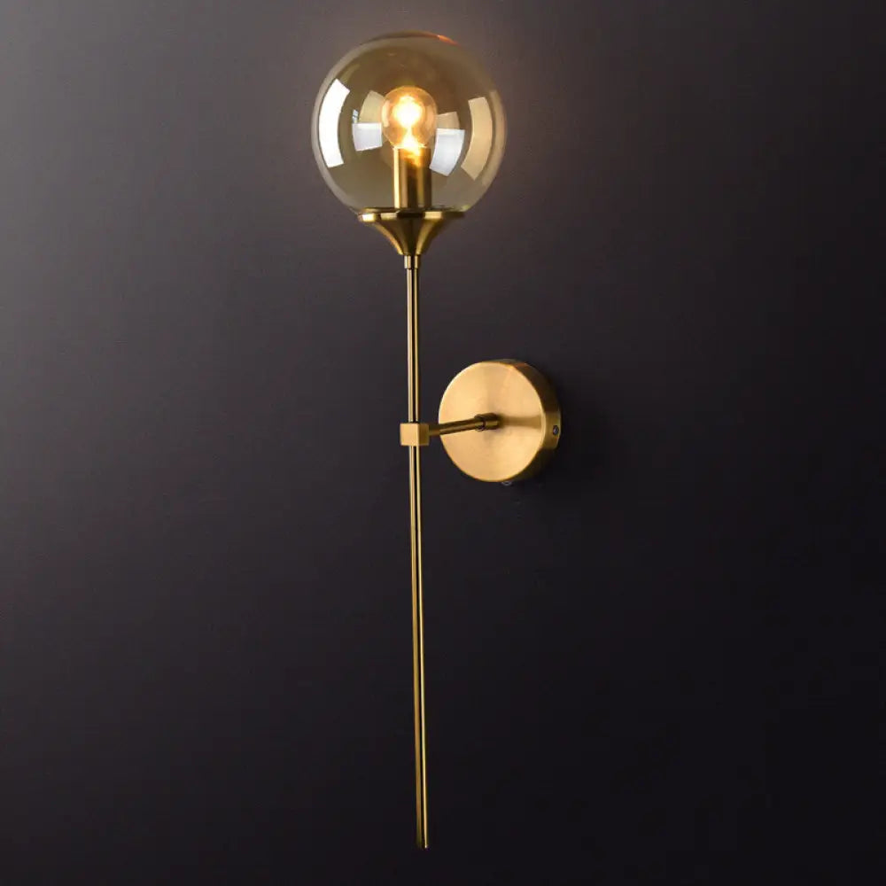 Postmodern Brass Pencil Arm Wall Lamp Sconce With Ball Glass Shade Amber