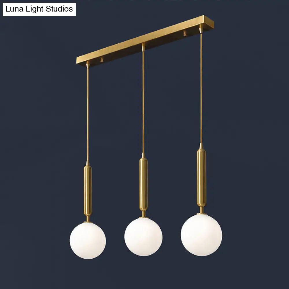 Postmodern Brass Pendant Ceiling Light With Ball Glass Shade - Ideal For Dining Rooms 3 Lights