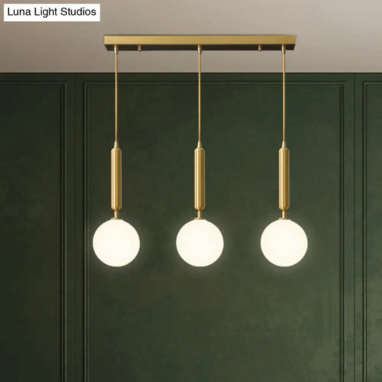 Postmodern Brass Pendant Ceiling Light With Ball Glass Shade - Ideal For Dining Rooms 3 Lights