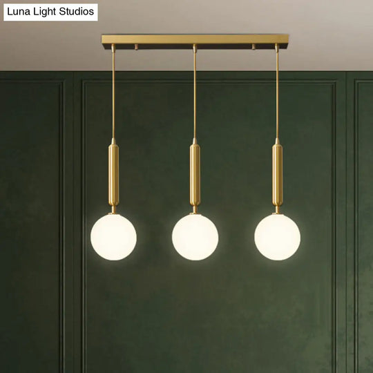 Postmodern Brass Pendant With Ball Glass Shades - Stylish 3-Light Ceiling Fixture For Dining Rooms