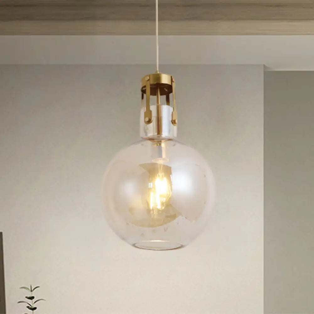 Postmodern Brass Pendant Lamp With Cognac Glass Shade - Bedside Lighting Solution