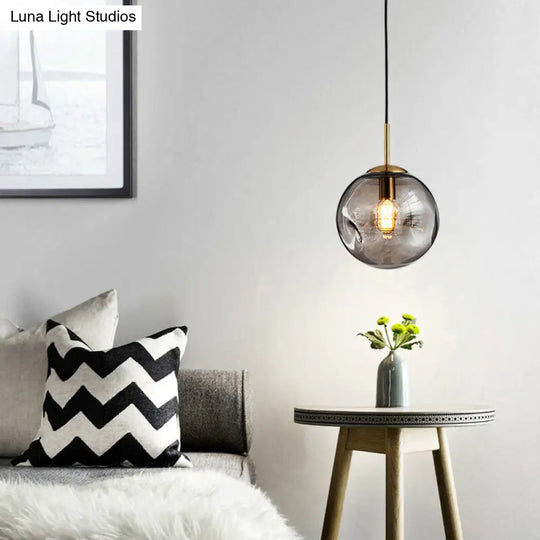 Dimpled Glass Globe Pendant Lamp: Postmodern Brass Hanging Light For Bedroom