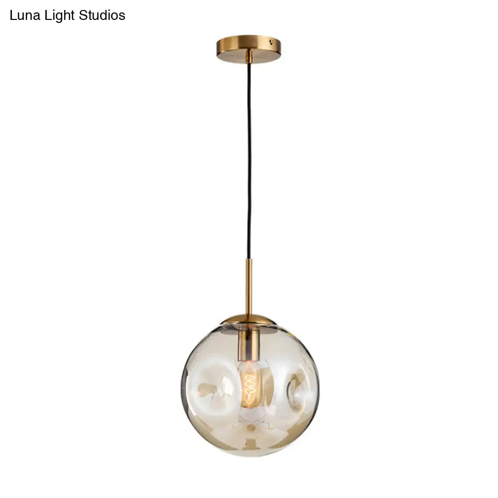 Dimpled Glass Globe Pendant Lamp: Postmodern Brass Hanging Light For Bedroom Cognac