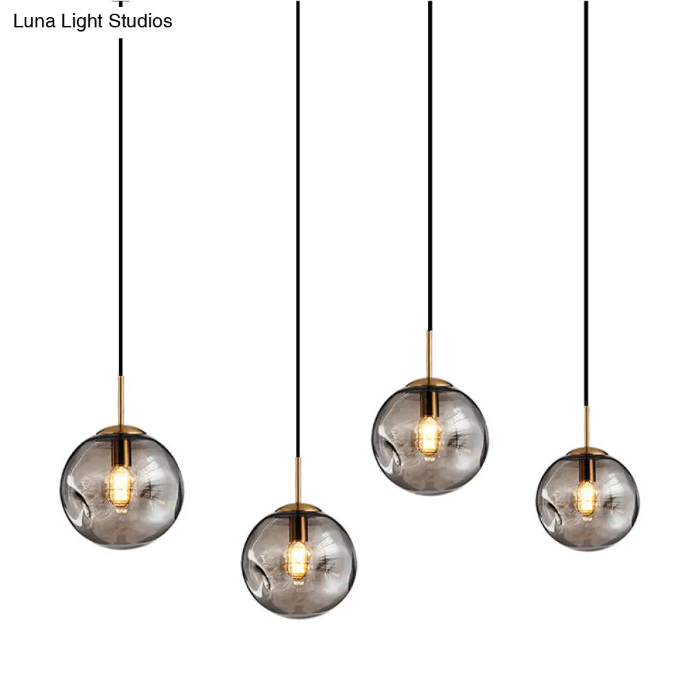 Postmodern Brass Pendant Lamp With Dimpled Glass Globe For Bedroom