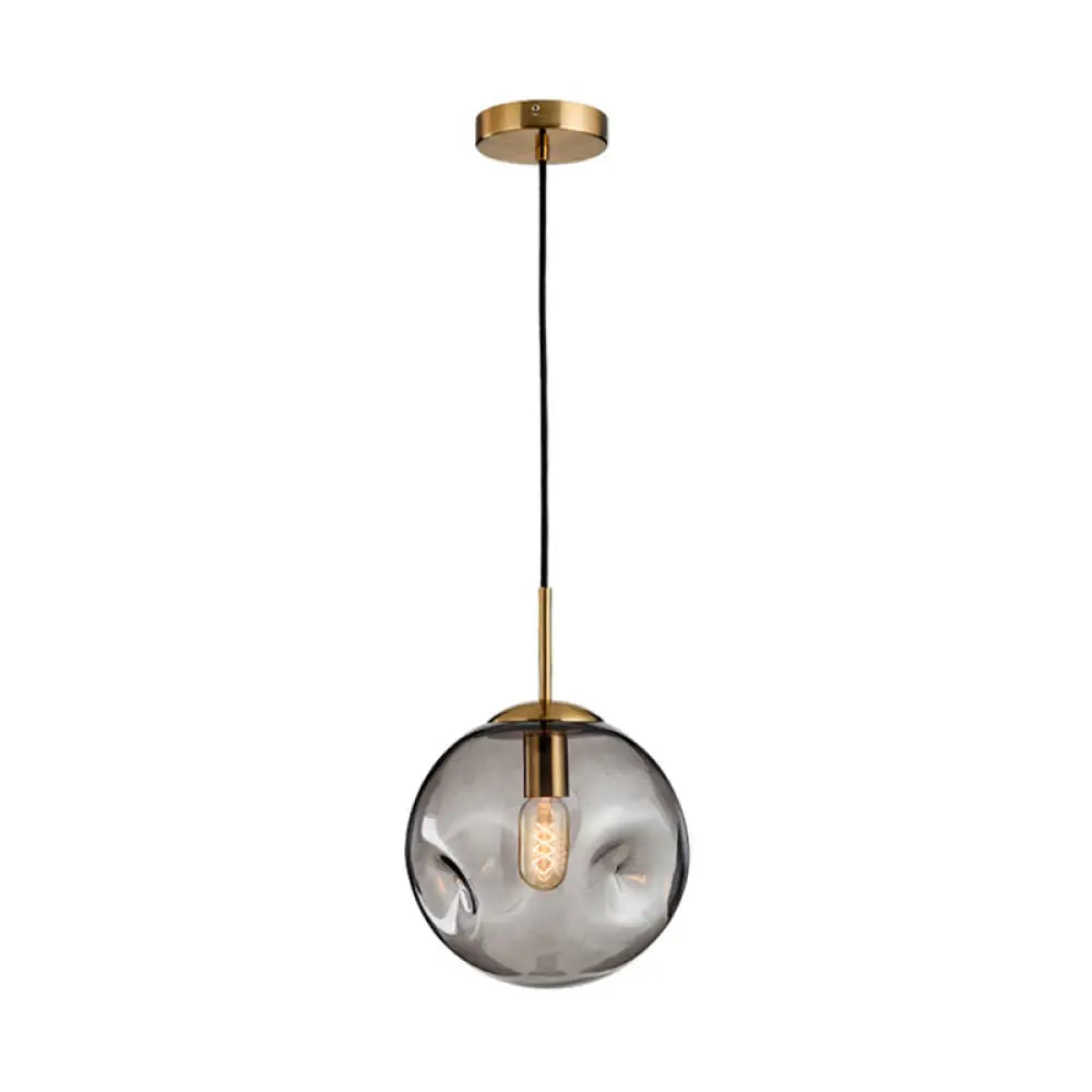 Postmodern Brass Pendant Lamp With Dimpled Glass Globe For Bedroom Smoke Gray