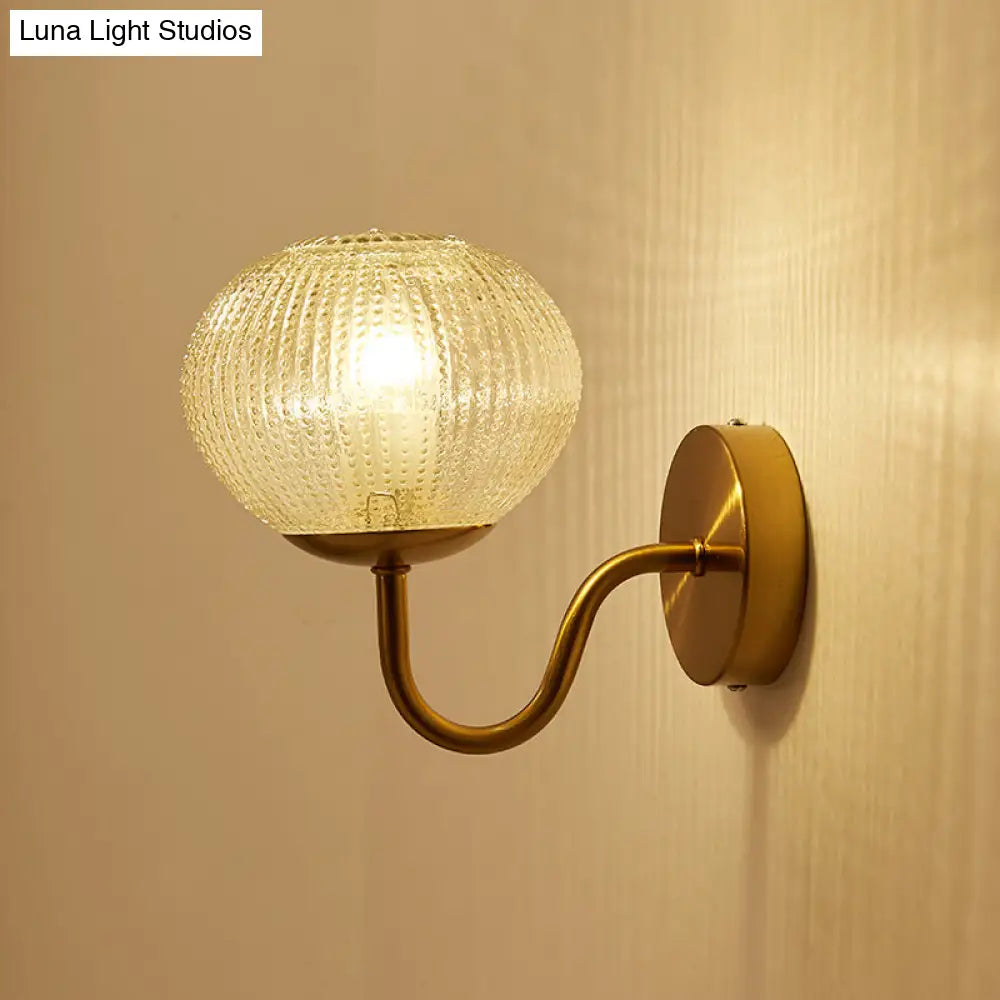 Postmodern Brass Sconce Bedside Wall Light With Textured Glass Shade - 1-Bulb Ball Shaped Lamp