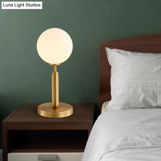 Postmodern Brass Table Lamp With White Glass Shade - Ball Accent Single Bulb