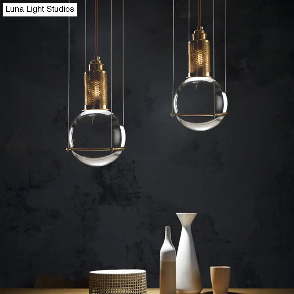 Postmodern Clear Glass Ball Pendant Ceiling Light With Gold Mesh Top - Single Hanging Lamp Kit