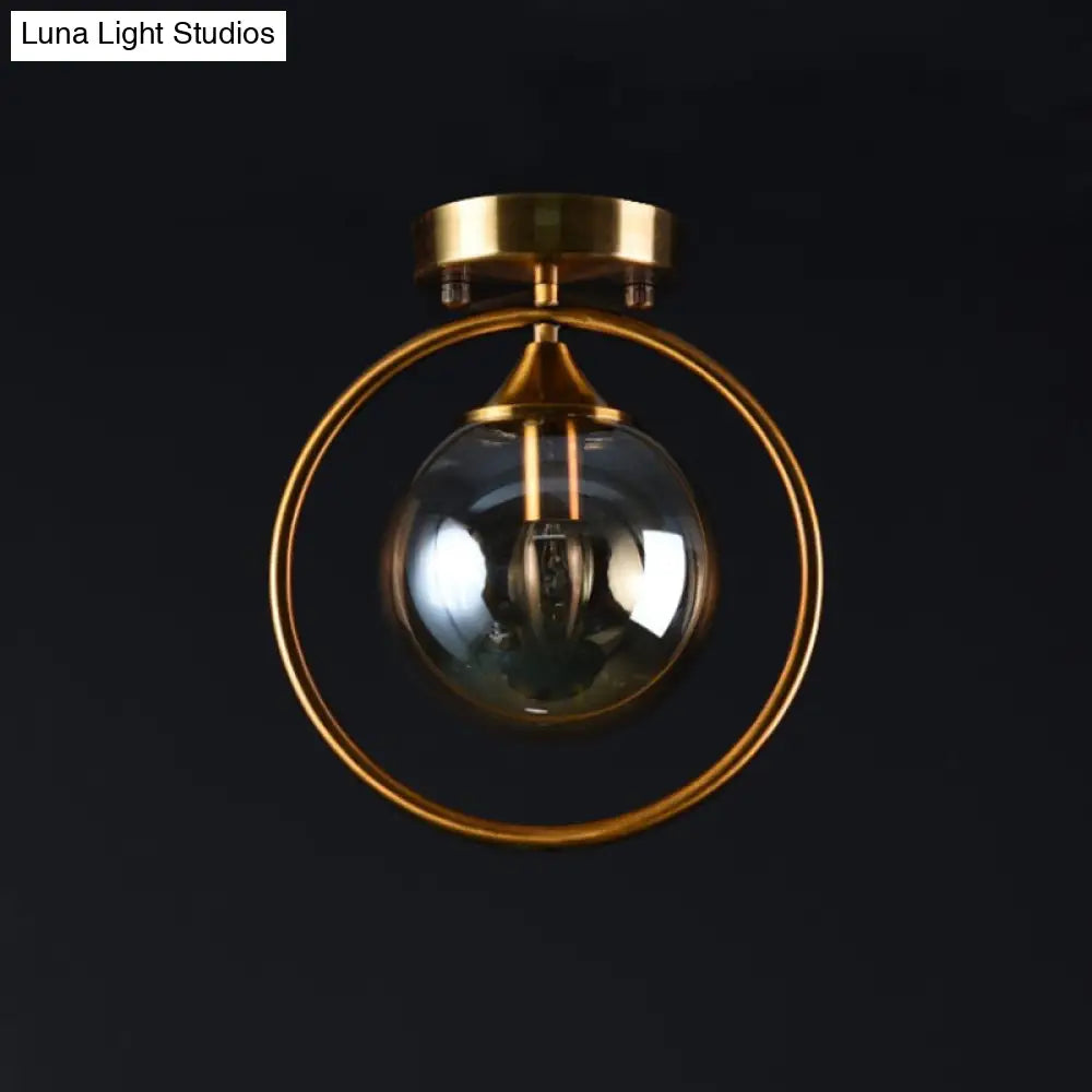 Postmodern Glass Ball Ceiling Light With Brass Metal Ring - 1-Light Semi-Flush Mount For Corridors