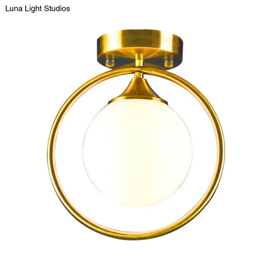 Postmodern Glass Ball Ceiling Light With Brass Metal Ring - 1-Light Semi-Flush Mount For Corridors