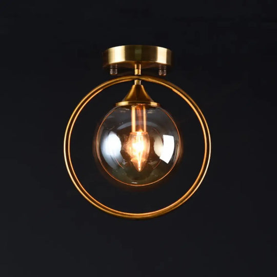 Postmodern Glass Ball Ceiling Light With Brass Metal Ring - 1-Light Semi-Flush Mount For Corridors