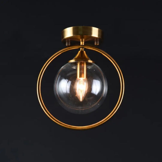 Postmodern Glass Ball Ceiling Light With Brass Metal Ring - 1-Light Semi-Flush Mount For Corridors