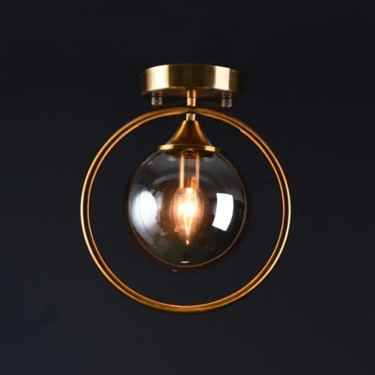 Postmodern Glass Ball Ceiling Light With Brass Metal Ring - 1-Light Semi-Flush Mount For Corridors