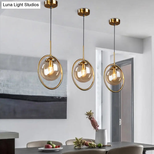 Postmodern Glass Pendant Light With Brass Ring For Bedroom - Single-Bulb Globe Down Lighting In