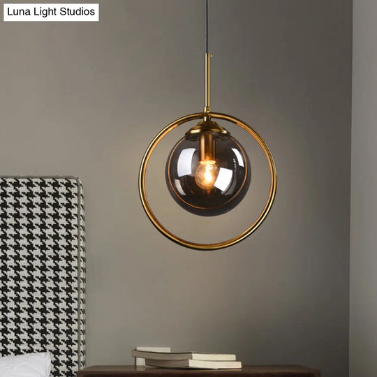 Postmodern Glass Pendant Light With Brass Ring For Bedroom - Single-Bulb Globe Down Lighting In