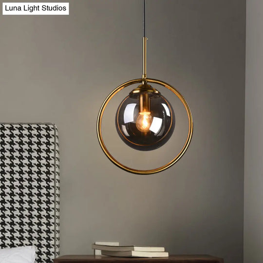 Postmodern Glass Pendant Light With Globe Down Lighting And Brass Ring For Bedroom