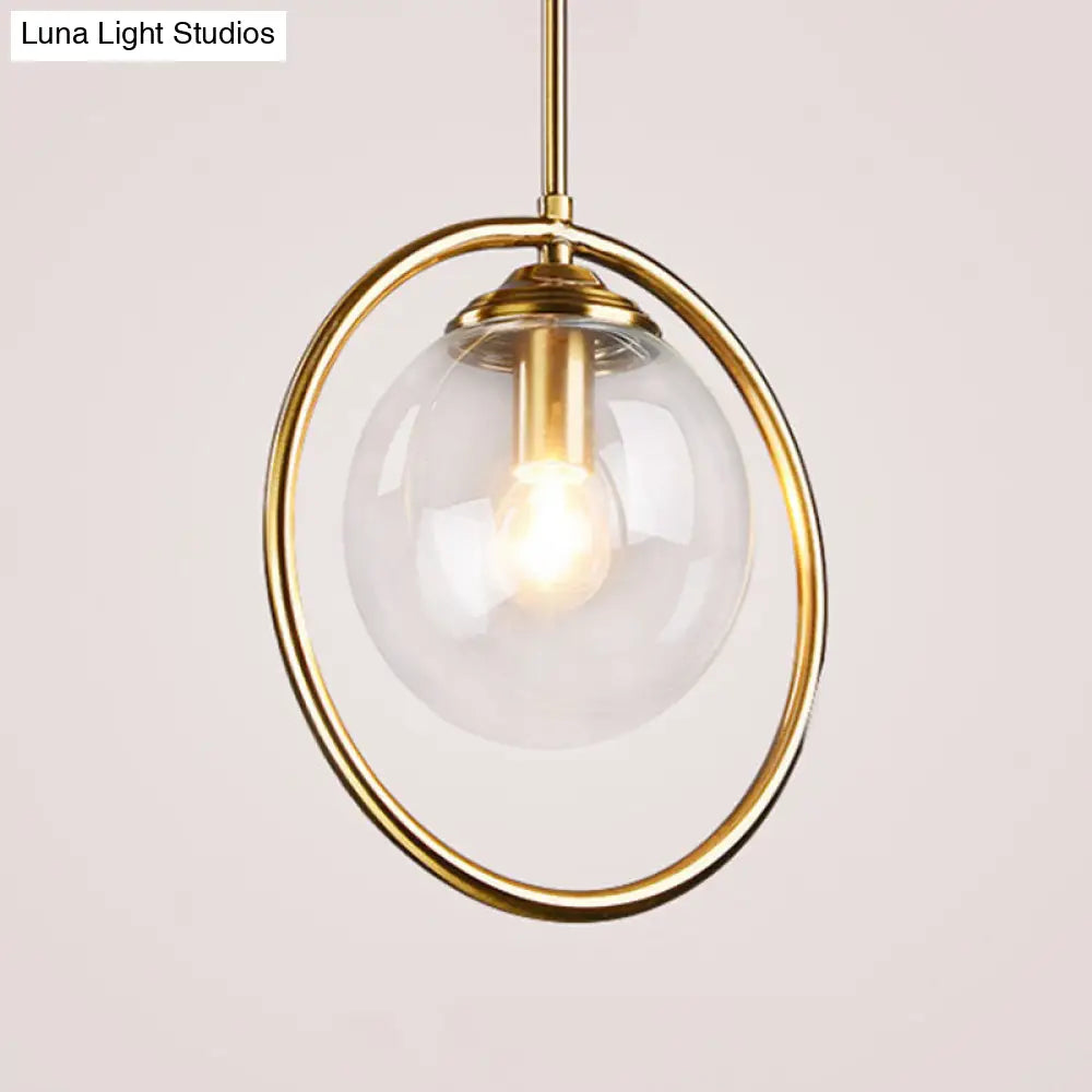 Postmodern Glass Pendant Light With Globe Down Lighting And Brass Ring For Bedroom