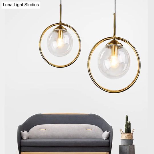 Postmodern Glass Pendant Light With Globe Down Lighting And Brass Ring For Bedroom