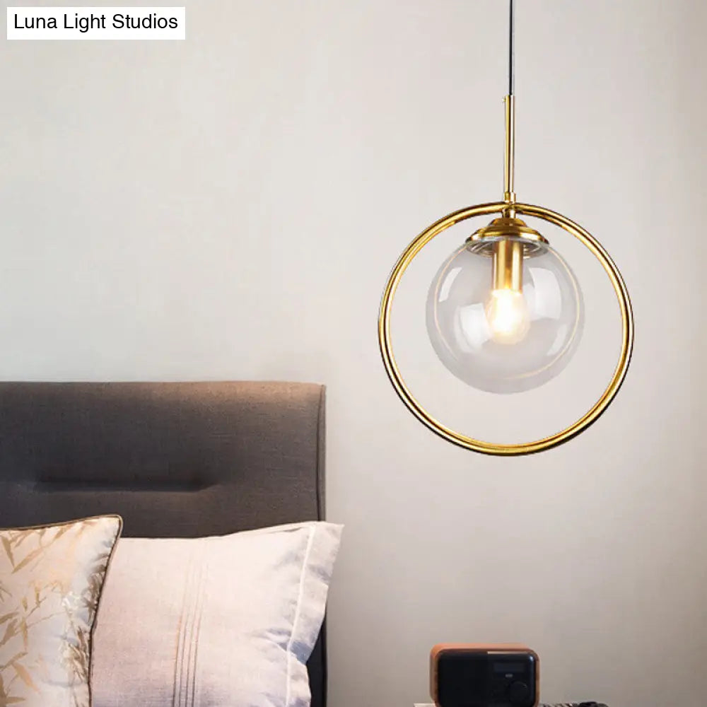 Postmodern Glass Pendant Light With Globe Down Lighting And Brass Ring For Bedroom Clear