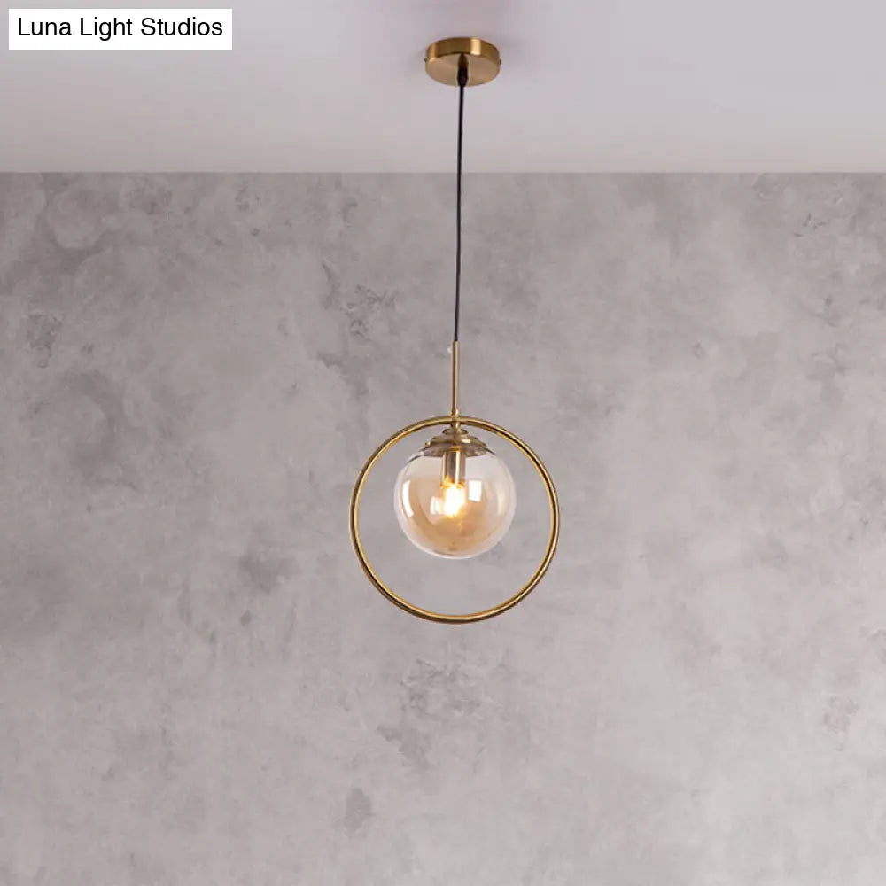 Postmodern Glass Pendant Light With Globe Down Lighting And Brass Ring For Bedroom Amber