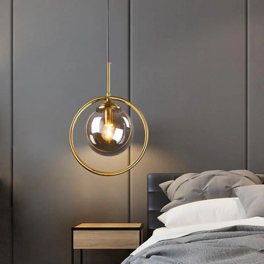 Postmodern Glass Pendant Light With Brass Ring For Bedroom - Single-Bulb Globe Down Lighting In