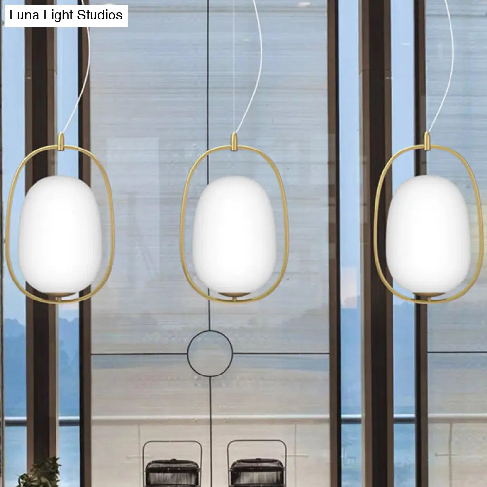 Postmodern Gold Cocoon Pendant Lamp With Frame And Glass Shade – Single Ceiling Hang Light