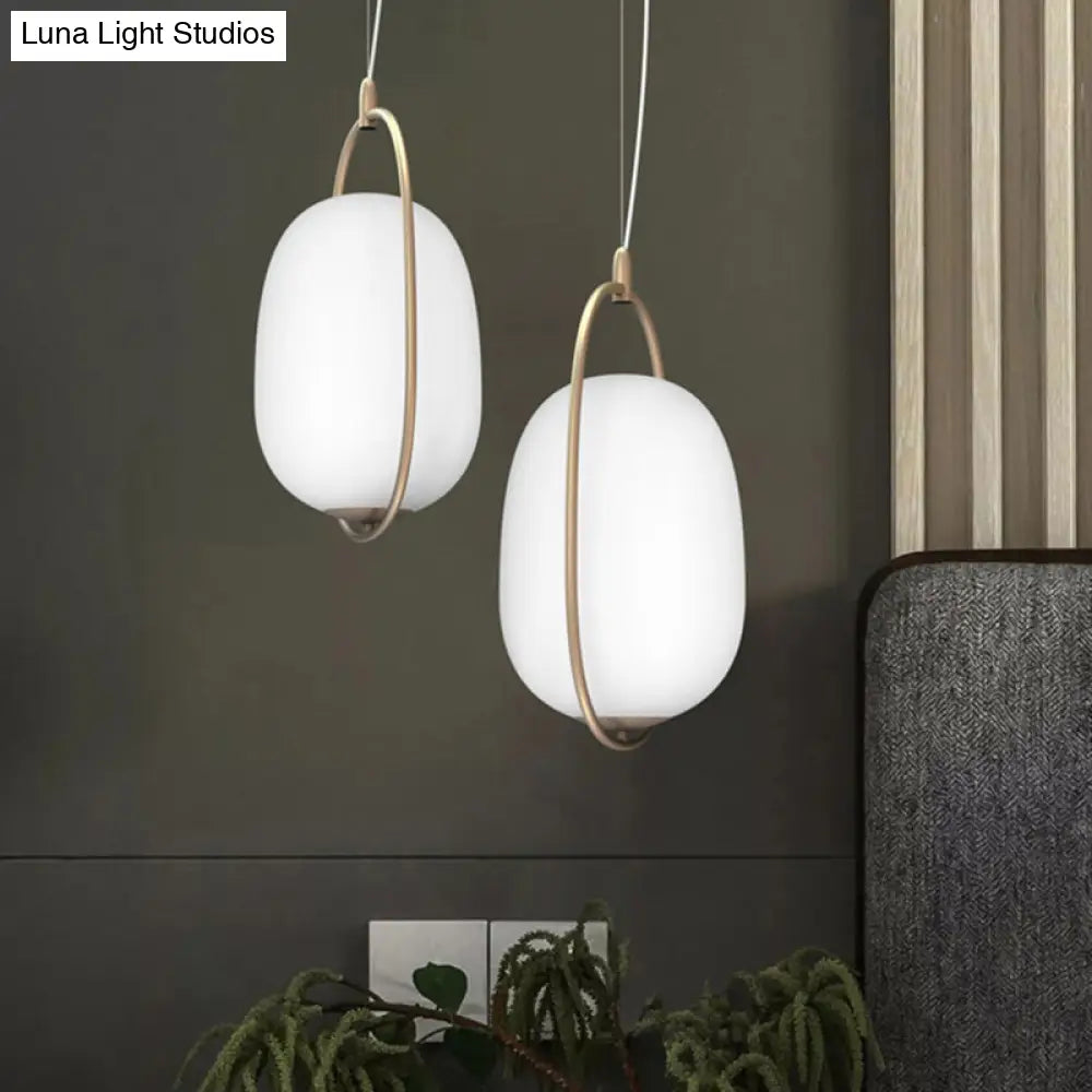 Postmodern Gold Cocoon Pendant Lamp With Frame And Glass Shade – Single Ceiling Hang Light