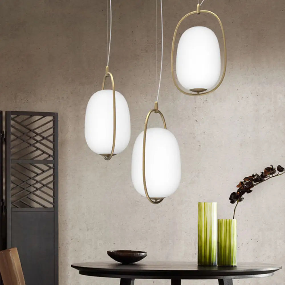 Postmodern Gold Cocoon Pendant Lamp With Frame And Glass Shade – Single Ceiling Hang Light