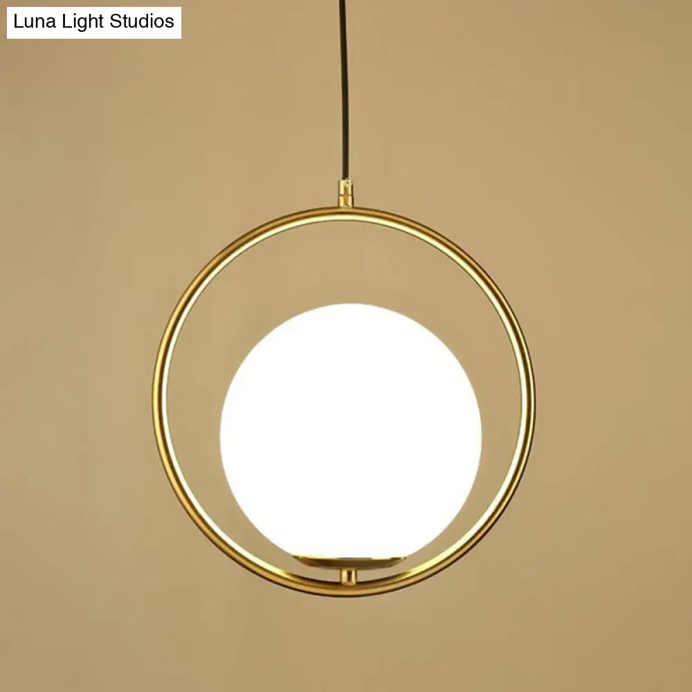 Postmodern Gold Globe Bedside Pendulum Ceiling Pendant With Cream Glass