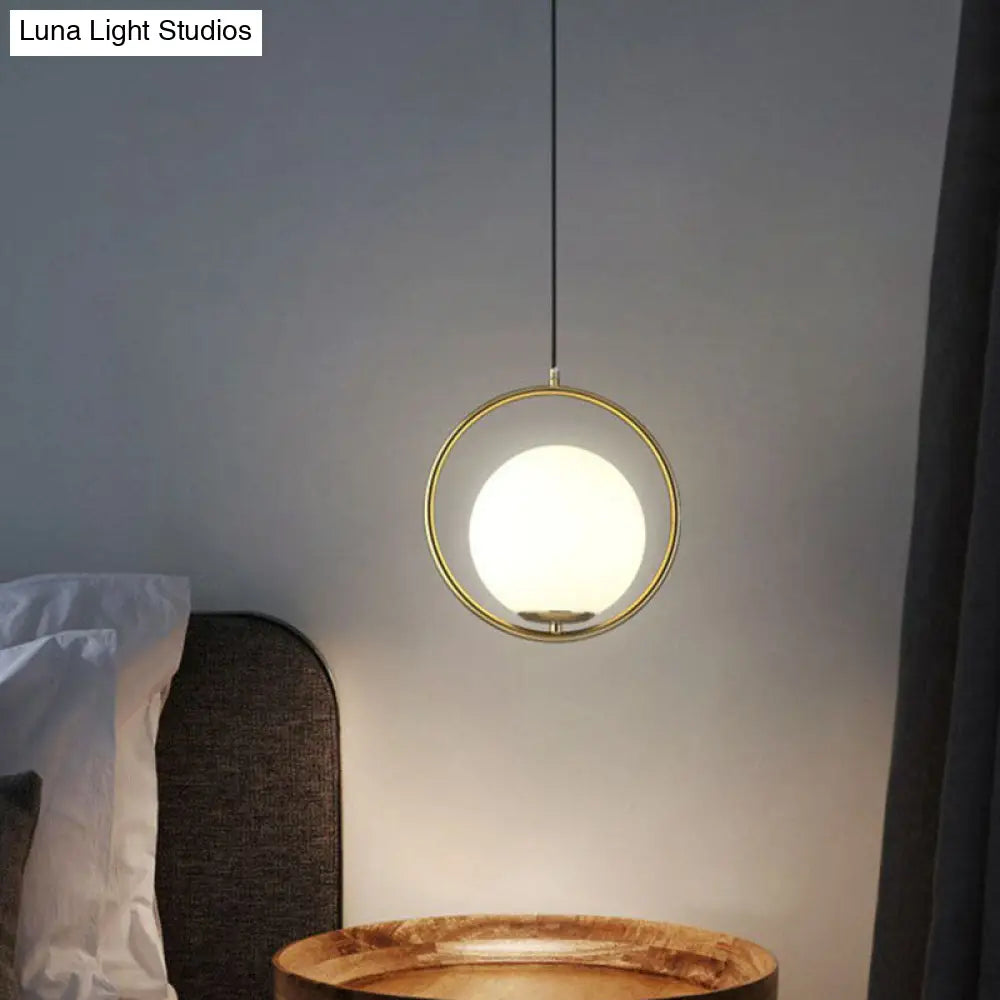 Modern Gold Ring Globe Pendant Ceiling Light With Cream Glass - Bedside Pendulum Design