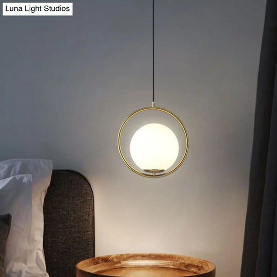 Modern Gold Ring Globe Pendant Ceiling Light With Cream Glass - Bedside Pendulum Design