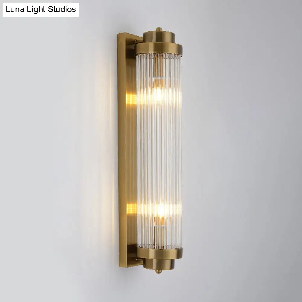 Postmodern Gold Wall Sconce With Clear Fluted Glass - 2 Lights Tubular Design