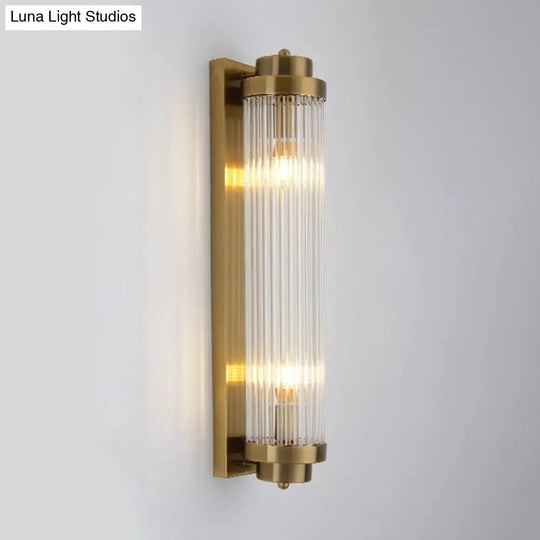 Postmodern Gold Wall Sconce With Clear Fluted Glass - 2 Lights Tubular Design