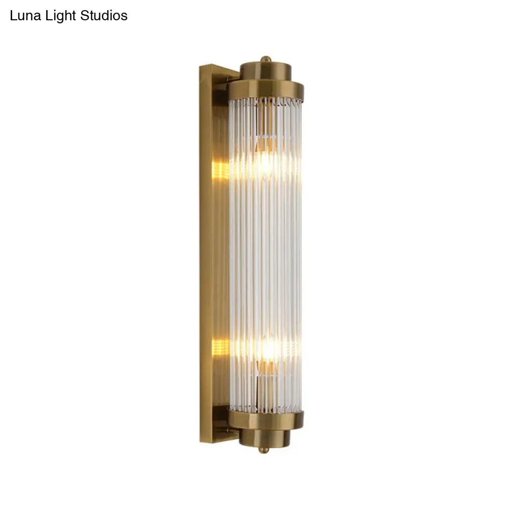 Postmodern Gold Wall Sconce With Clear Fluted Glass - 2 Lights Tubular Design