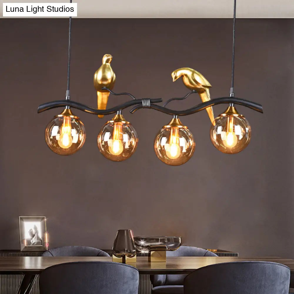 Postmodern Iron Pendant Light With 4-Lights Black/Gold Finish Amber Ball Glass Shade Bird Deco -