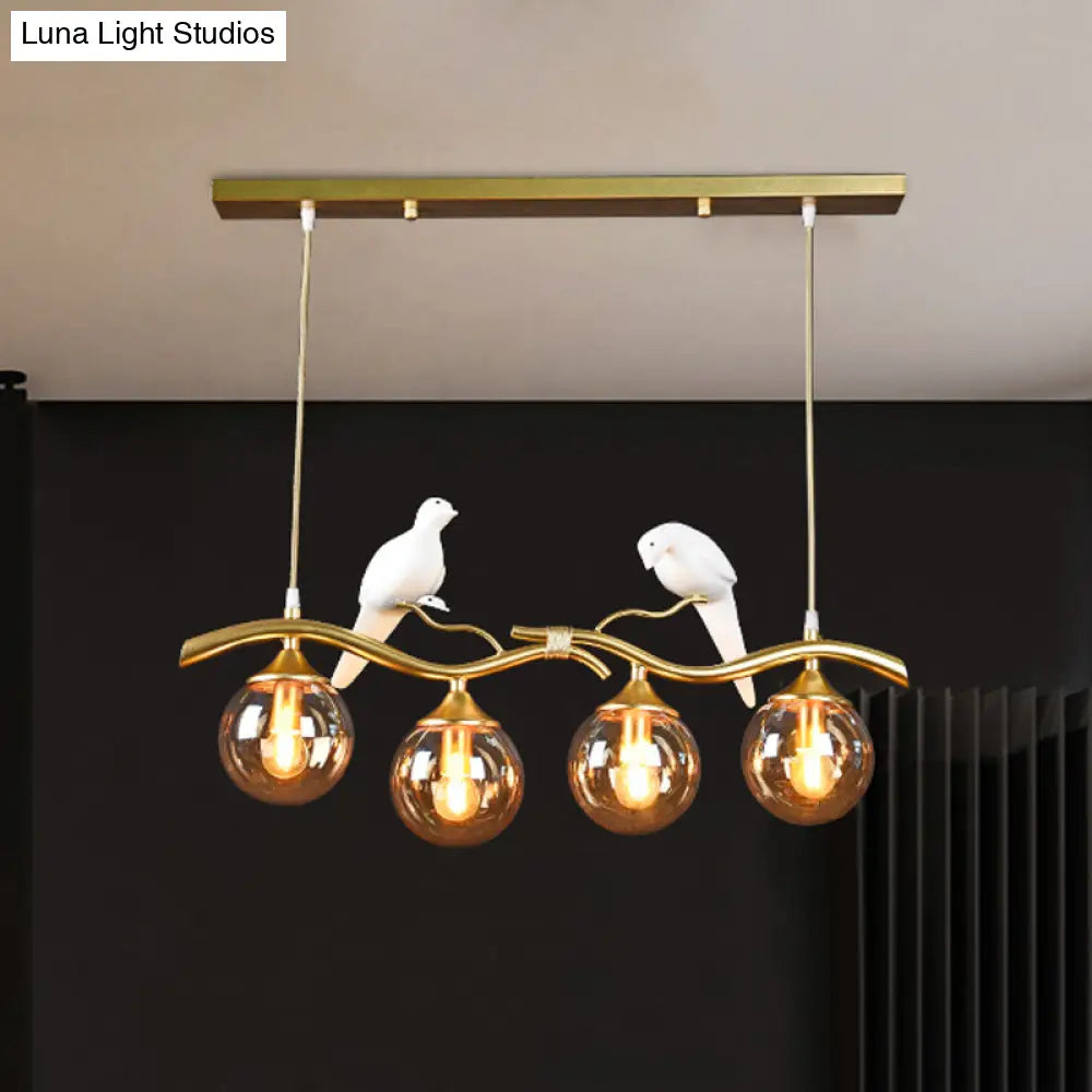 Postmodern Iron Pendant Light With 4-Lights Black/Gold Finish Amber Ball Glass Shade Bird Deco -