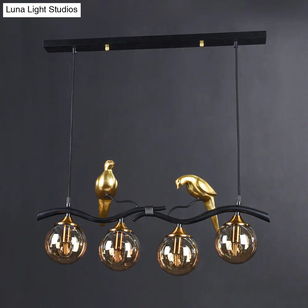 Postmodern Iron Pendant Light With 4-Lights Black/Gold Finish Amber Ball Glass Shade Bird Deco -