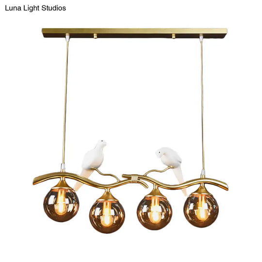 Postmodern Iron Pendant Light With 4-Lights Black/Gold Finish Amber Ball Glass Shade Bird Deco -