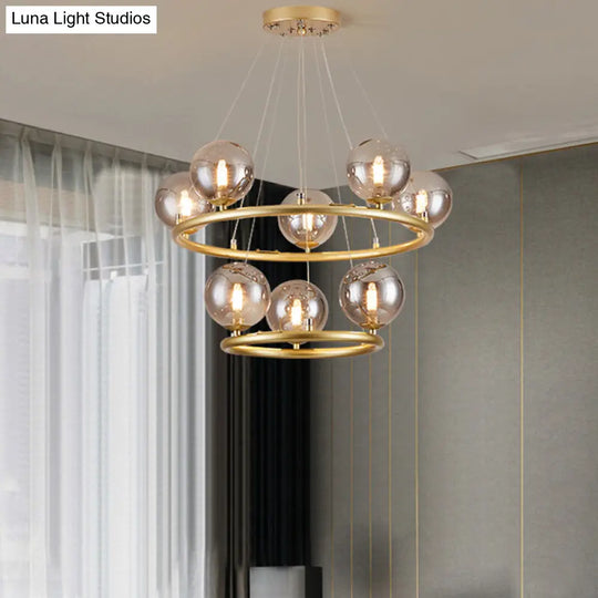 Postmodern Metal Pendant Chandelier With Glass Ball Shade