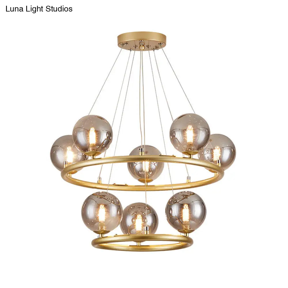 Postmodern Metal Pendant Chandelier With Glass Ball Shade