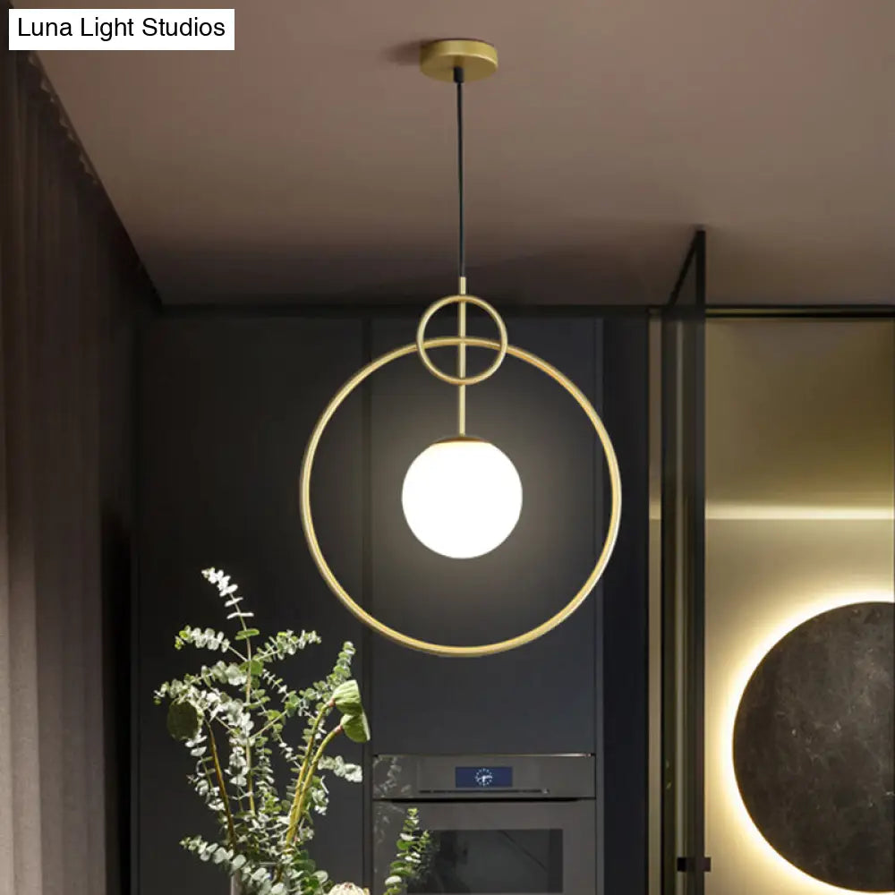 Postmodern Milk Glass Ball Pendant Light With Gold Circles - 1-Light Ceiling Lamp For Dining Room