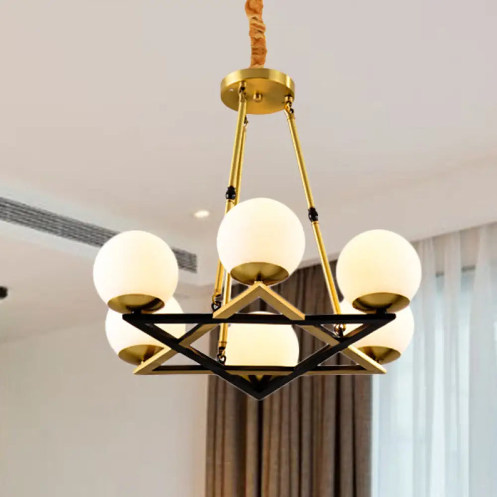 Postmodern Polygon Metal Chandelier With Brass Finish And Globe White Glass Shades 6 /