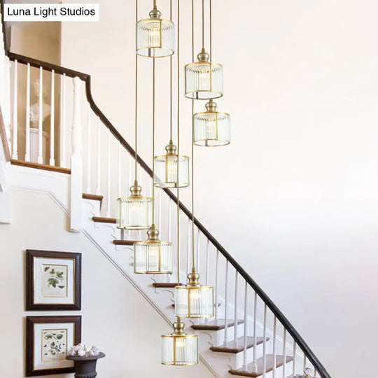 Stylish Brass Cylinder Pendant Light Fixture With Ribbed Glass - Ideal For Stairways